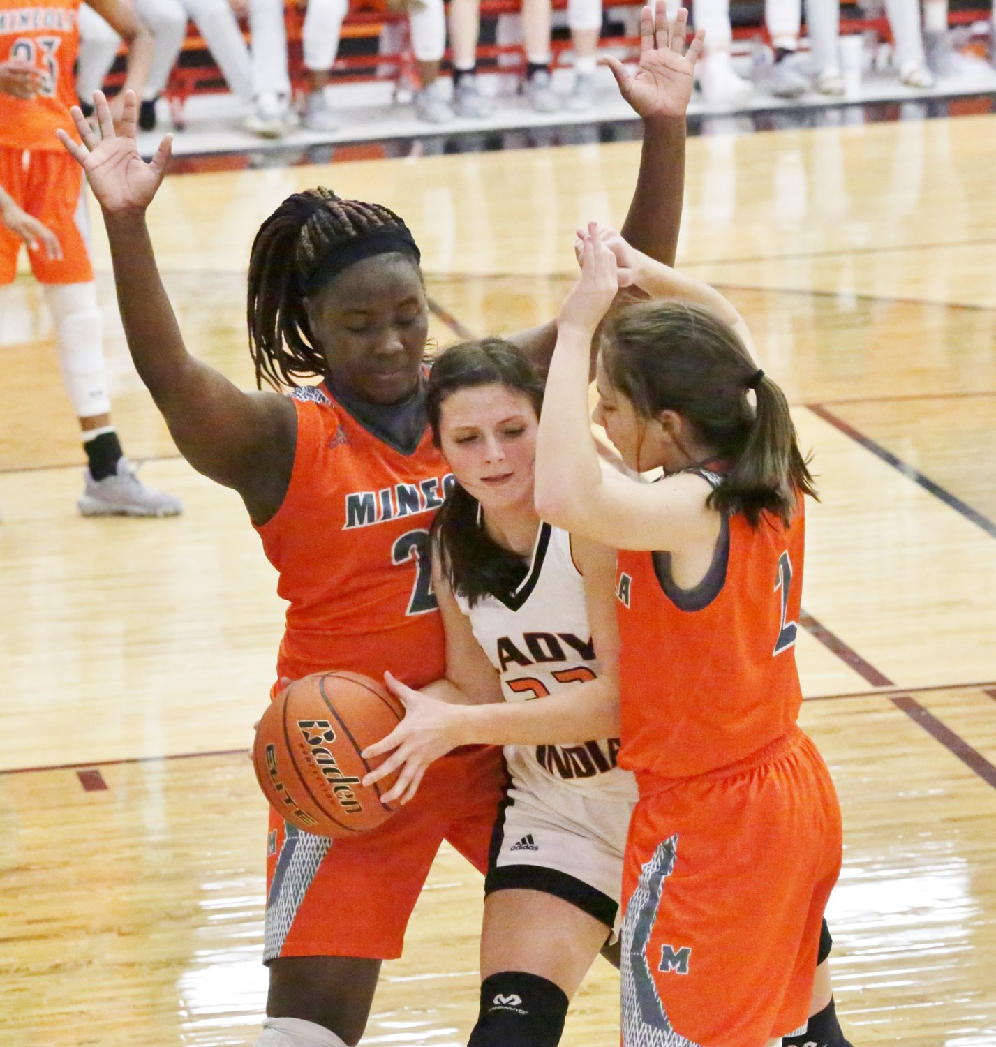 Tiara Stephens (left) and Meghan Brewington trap the ball against Grand Saline. (Monitor photo by John Arbter)